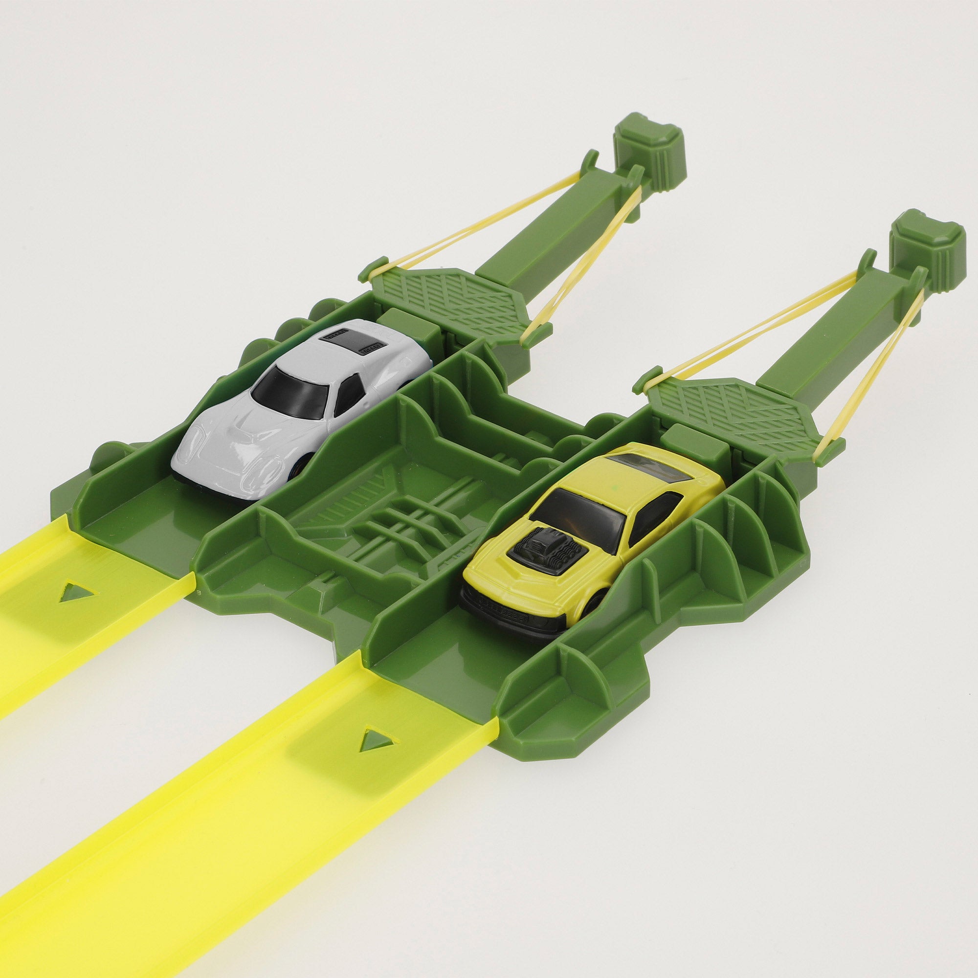 Pista de coches dinosaurio con doble lanzador y dos coches Teamsterz