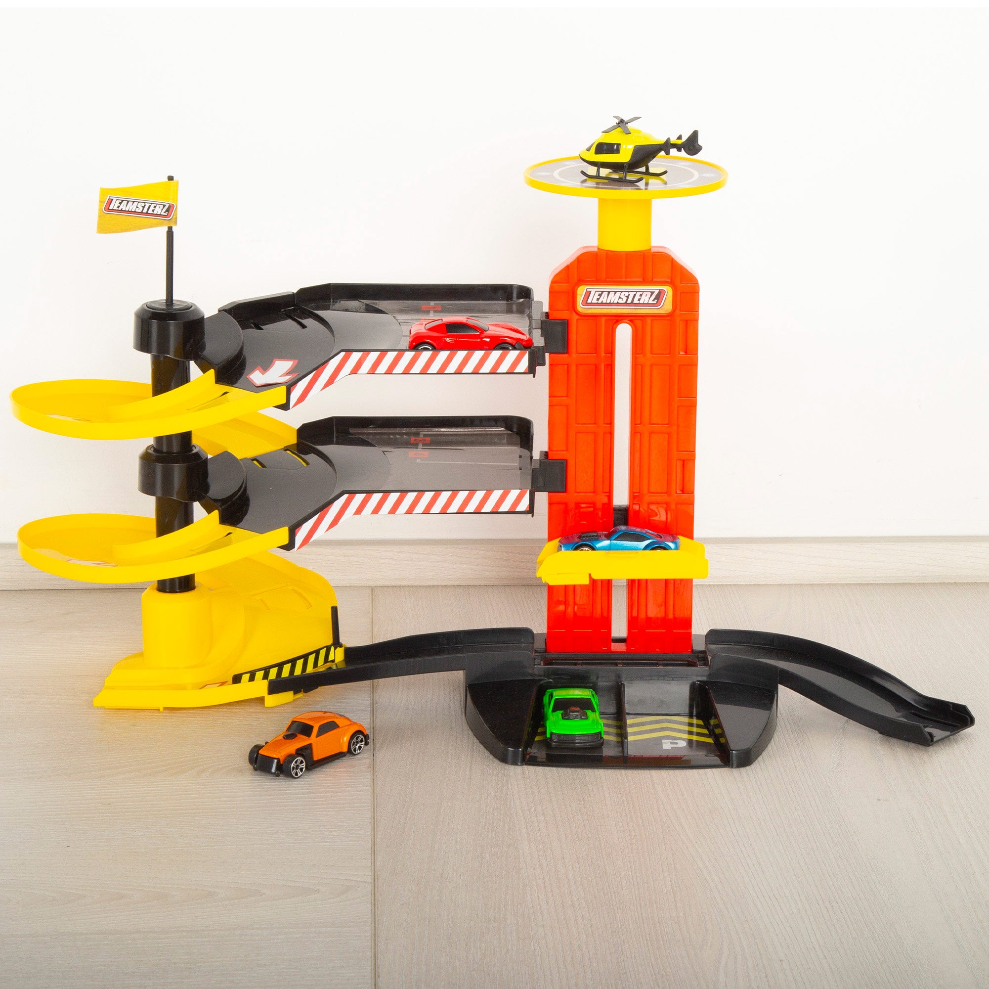 Parking de coches 3 niveles con helicóptero y coches metálicos Teamsterz