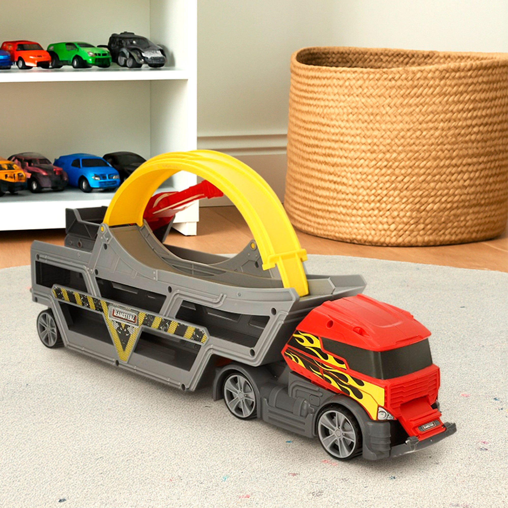 Camión lanzador de coches con pista looping y coche metálico Teamsterz