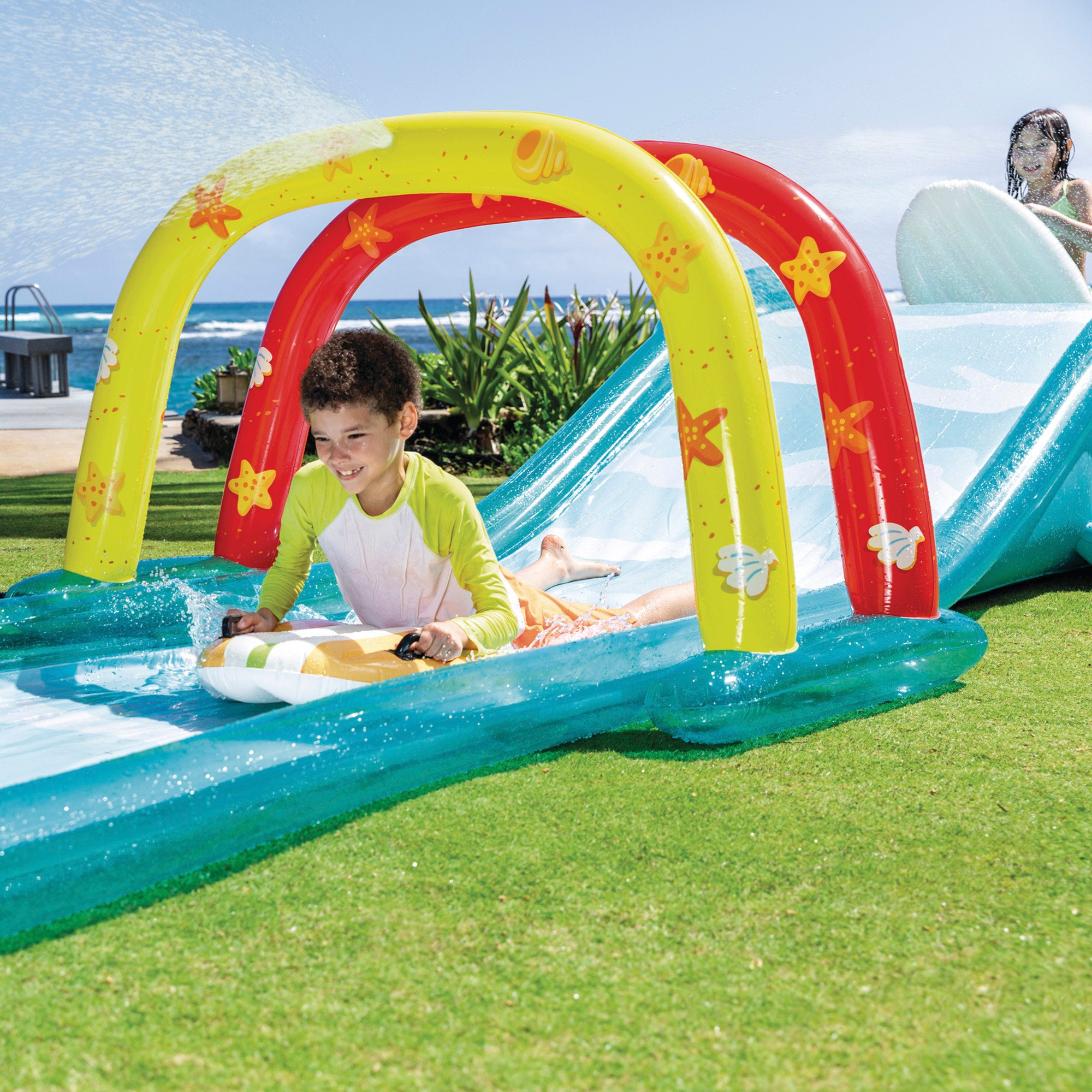 INTEX Pista deslizante agua con aspersor, tablas de surf y tobogán