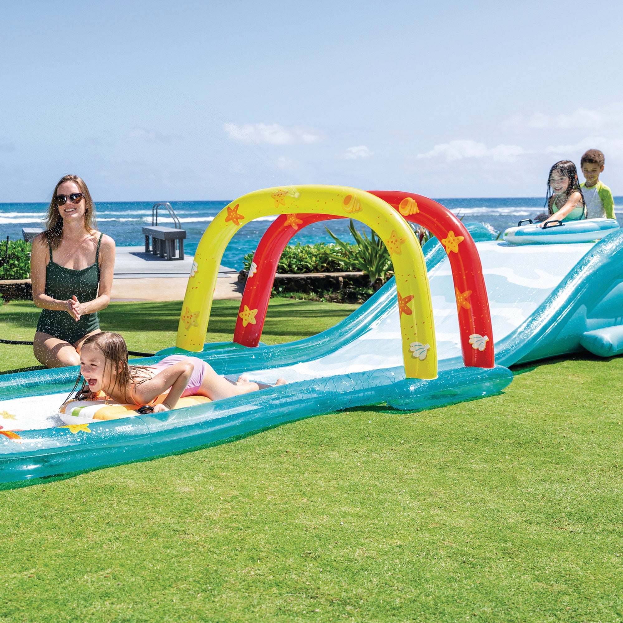 INTEX Pista deslizante agua con aspersor, tablas de surf y tobogán